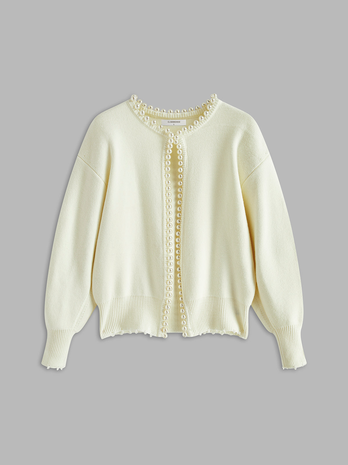 Gunhild™ | Cardigan med perlekant og frynset fald