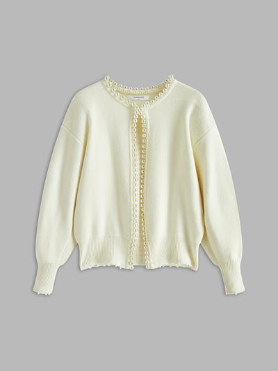 Gunhild™ | Cardigan med perlekant og frynset fald