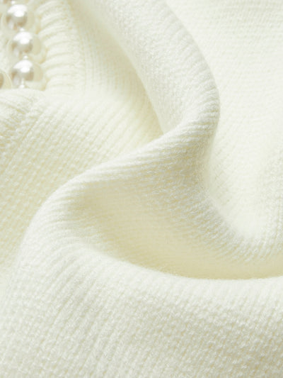 Gunhild™ | Cardigan med perlekant og frynset fald